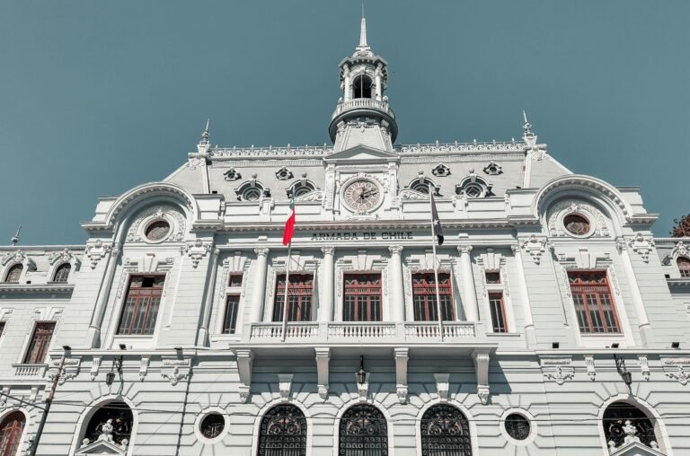 Majestic view of the Armada de Chile building in Valparaíso, Chile, with clear blue skies.