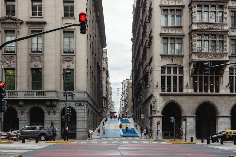 Urban street scene capturing the architecture and activity in Buenos Aires.